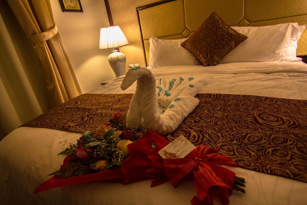 Rest Night Serviced Apartments- Alhamra Riyadh Ruang foto A towel swan